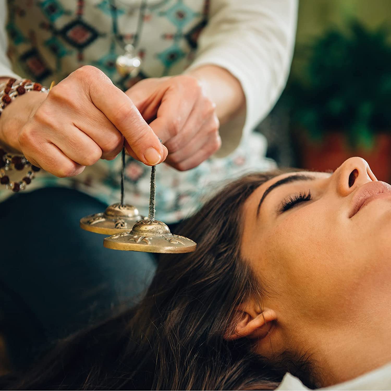 Tibetan Tingsha Bell being used during meditation